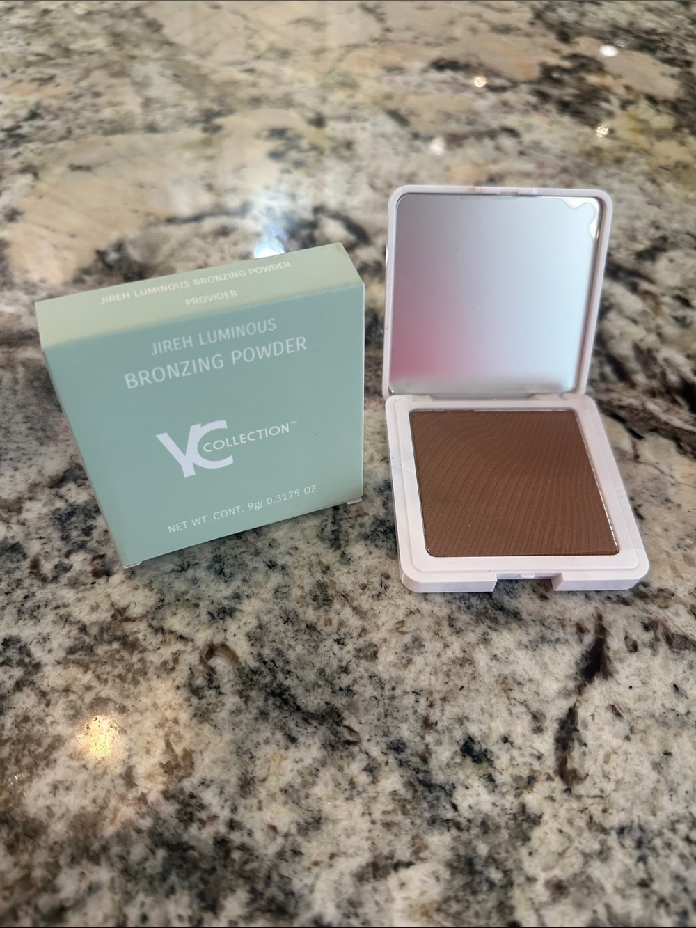 NY Collection Bronzing Powder — Warm Brown Compact
